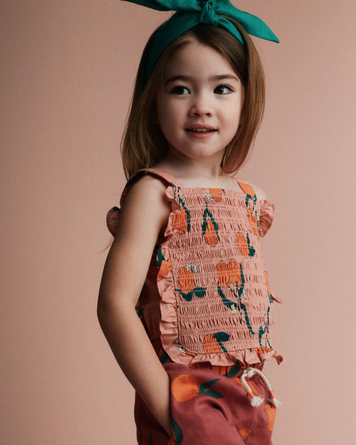 Toddler Girl Smocked Bib Top in Clementine Grove Print - Light Pink